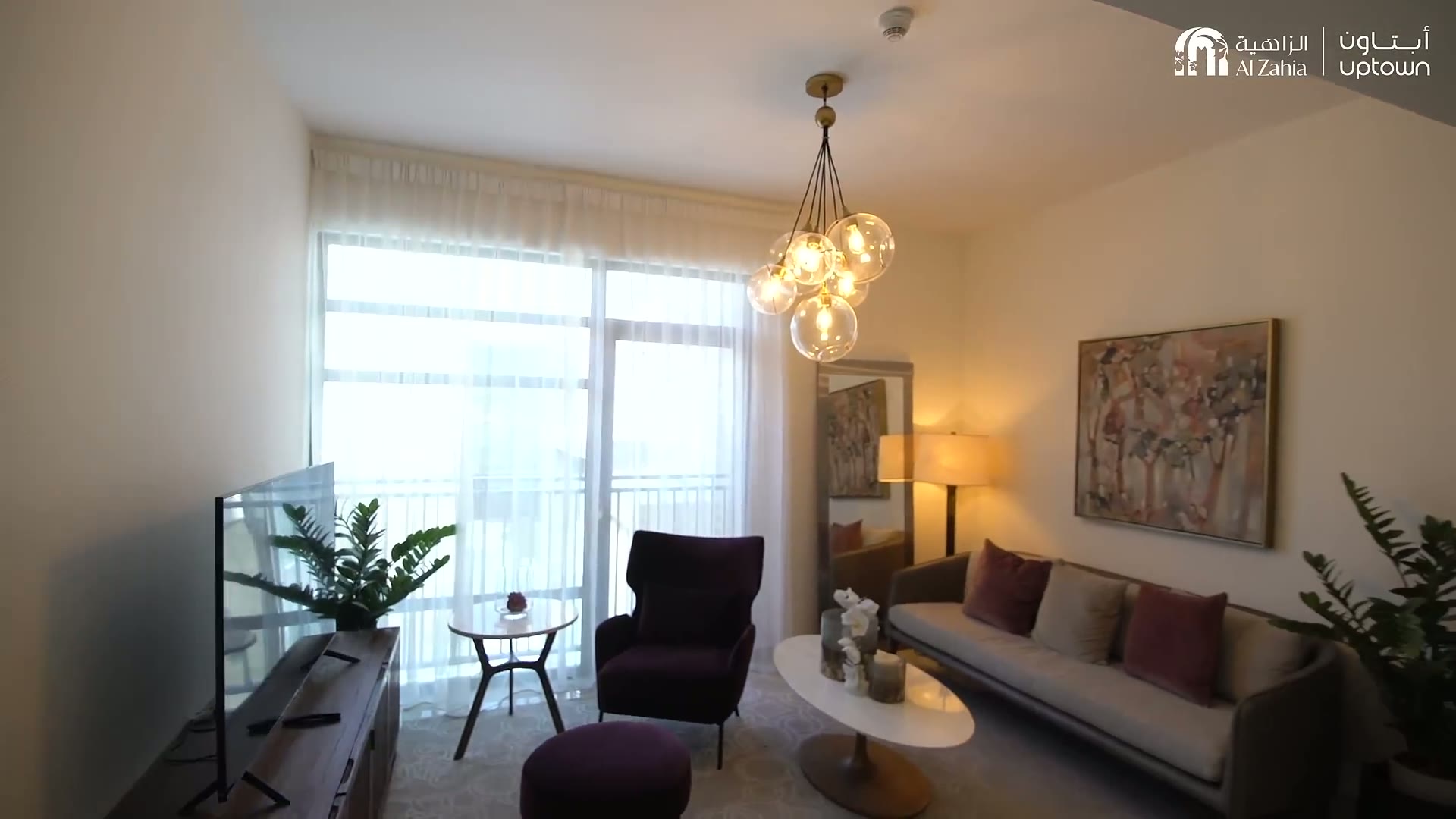 Contemporary apartment buildings and landscaped streets at Uptown Zahia in New Zahia, Sharjah