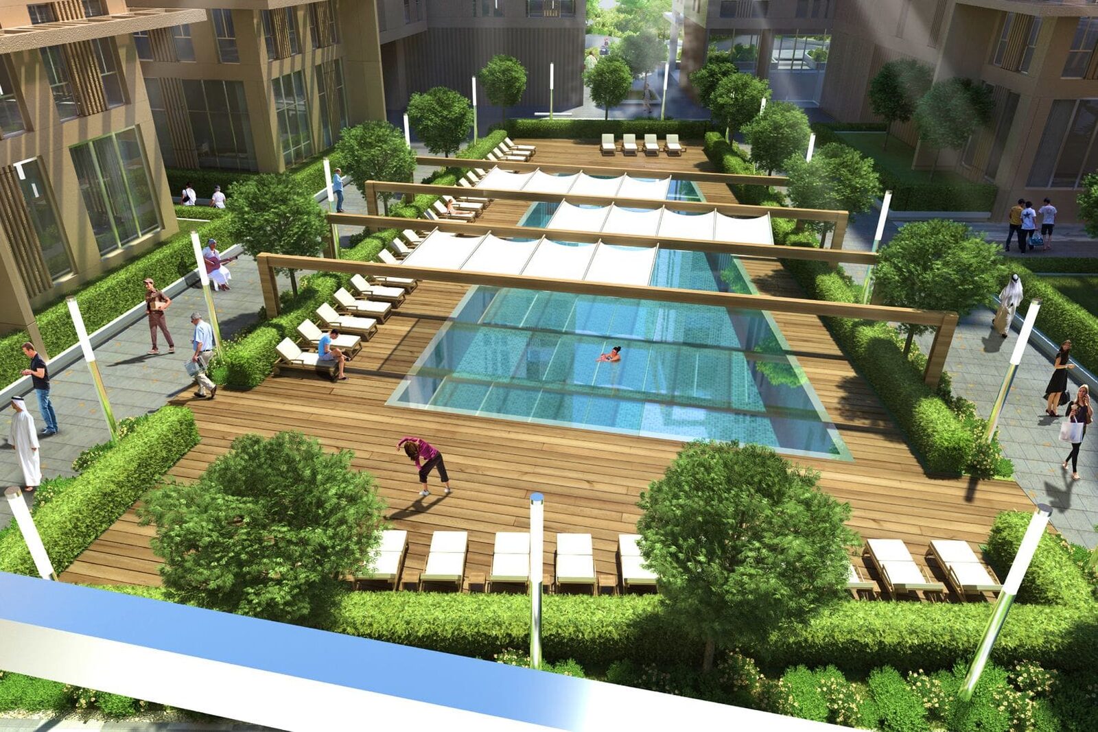 Pool deck with sun loungers between apartment buildings at Al Mamsha