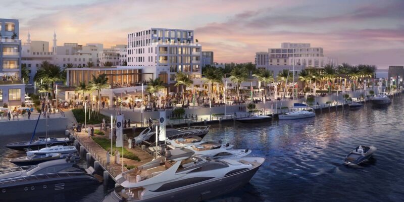 Marina and waterfront buildings at Maryam Island with yachts moored