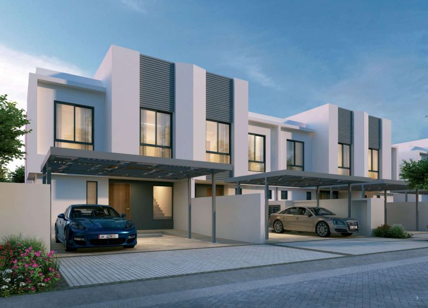 Pair of modern townhouses with front gardens at Al Zahia