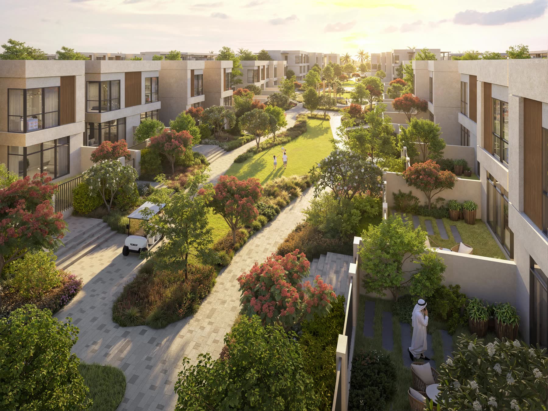 Landscaped courtyard park framed by solar-roofed homes at Sharjah Sustainable City II