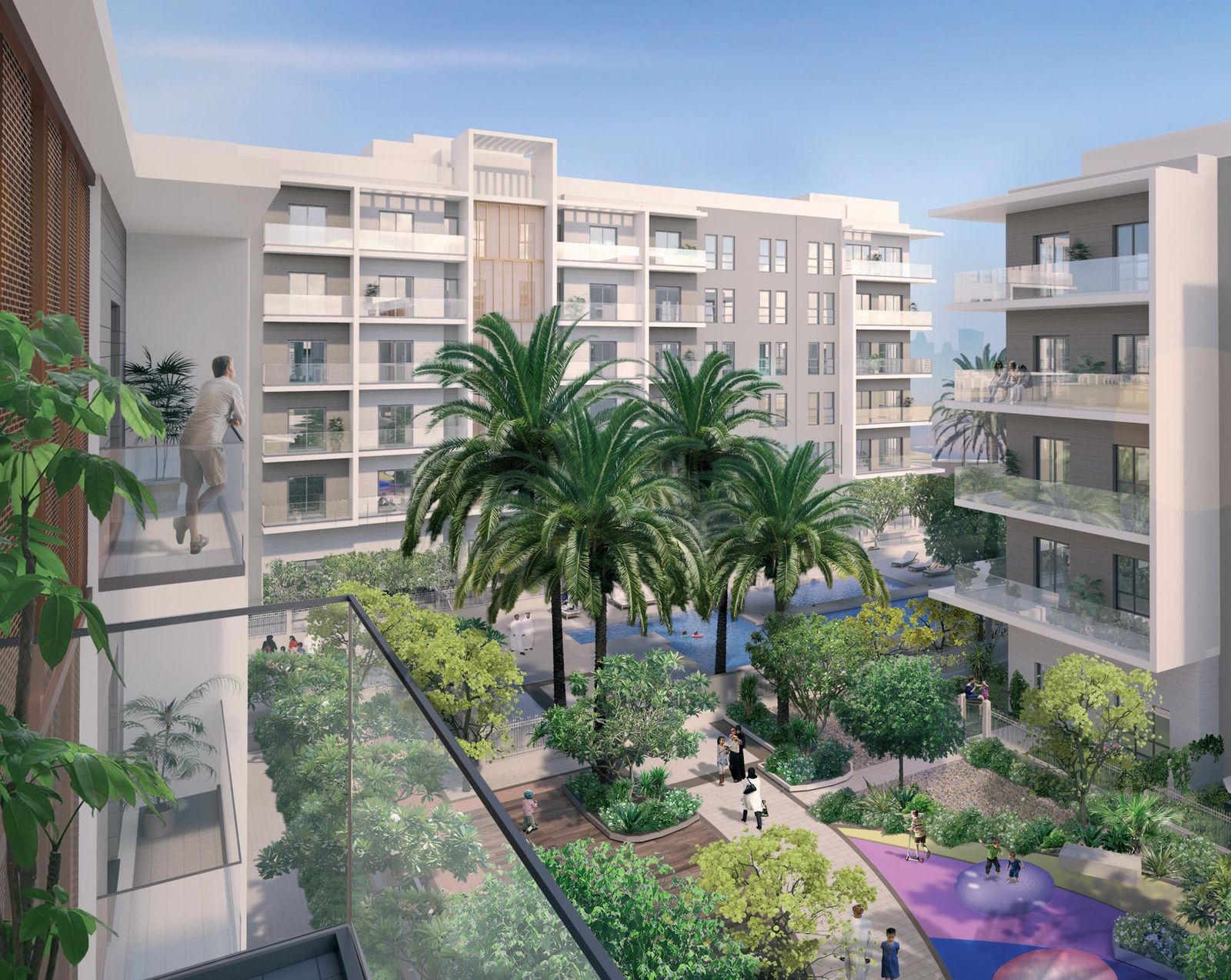 Apartment courtyard with palms and planting at Al Zahia, Sharjah
