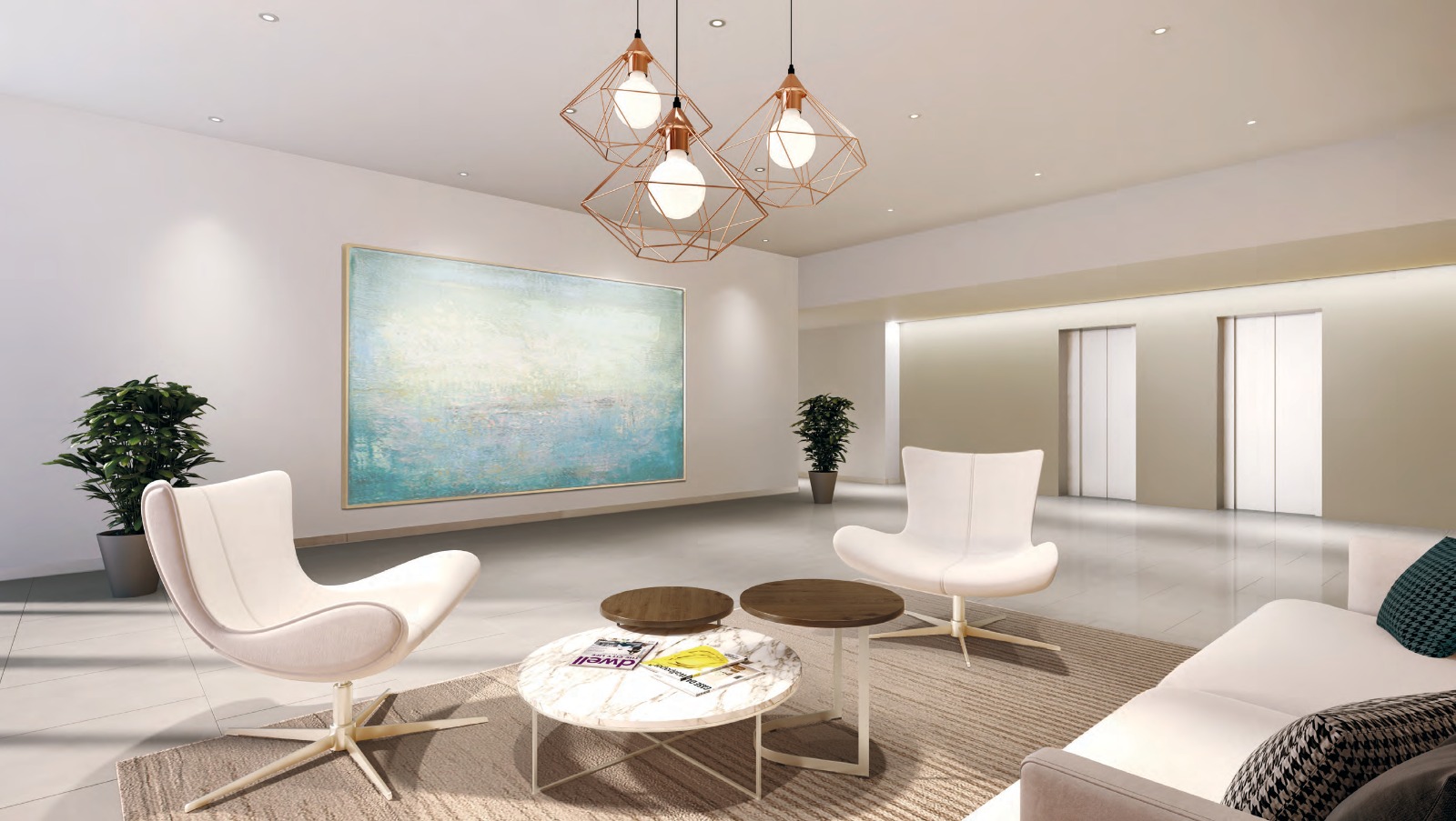 Bright residential lobby with lounge seating and pendant lighting at Uptown Zahia