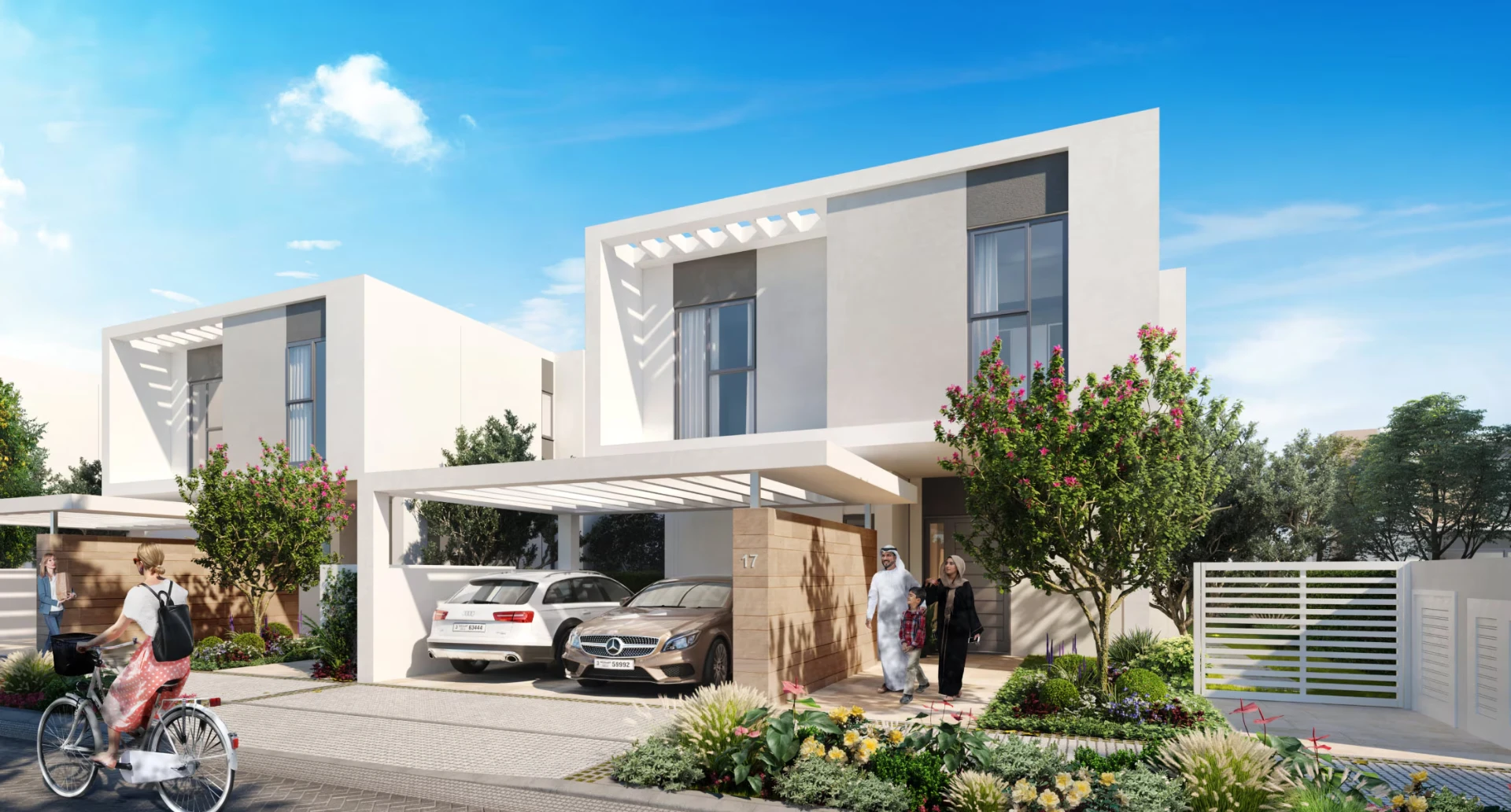 Modern white family villas with landscaped gardens in Al Zahia, Sharjah