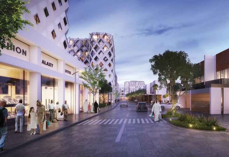Retail street with cafes and shopfronts under the apartments at Aljada