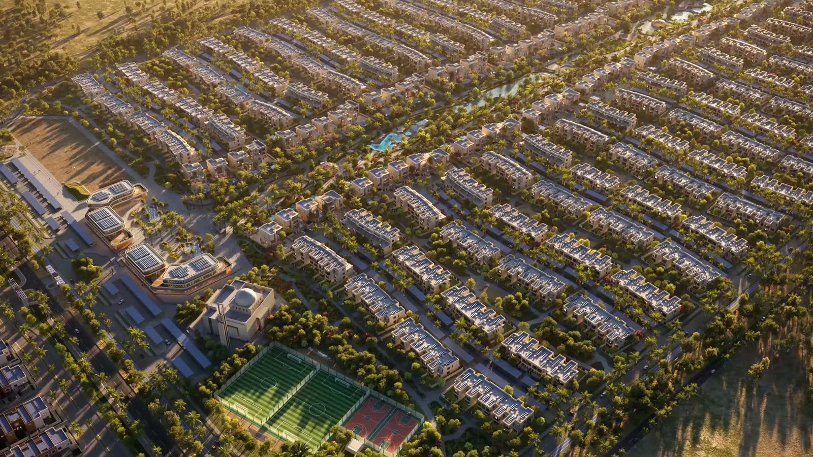 Aerial view of Sharjah Sustainable City II, with palm-lined green spine and solar-roofed homes